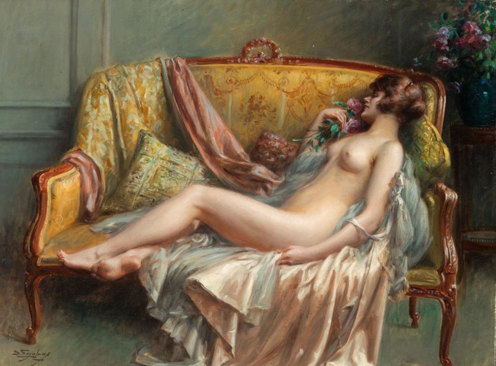 Nudo, sdraiato su un divano